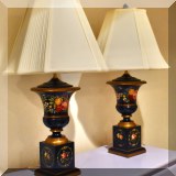 D027. 2 Black painted wood urn-shaped lamps. 31”h - $125 each 